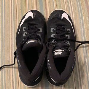 Black Nike high top basketball shoes, size 4.5